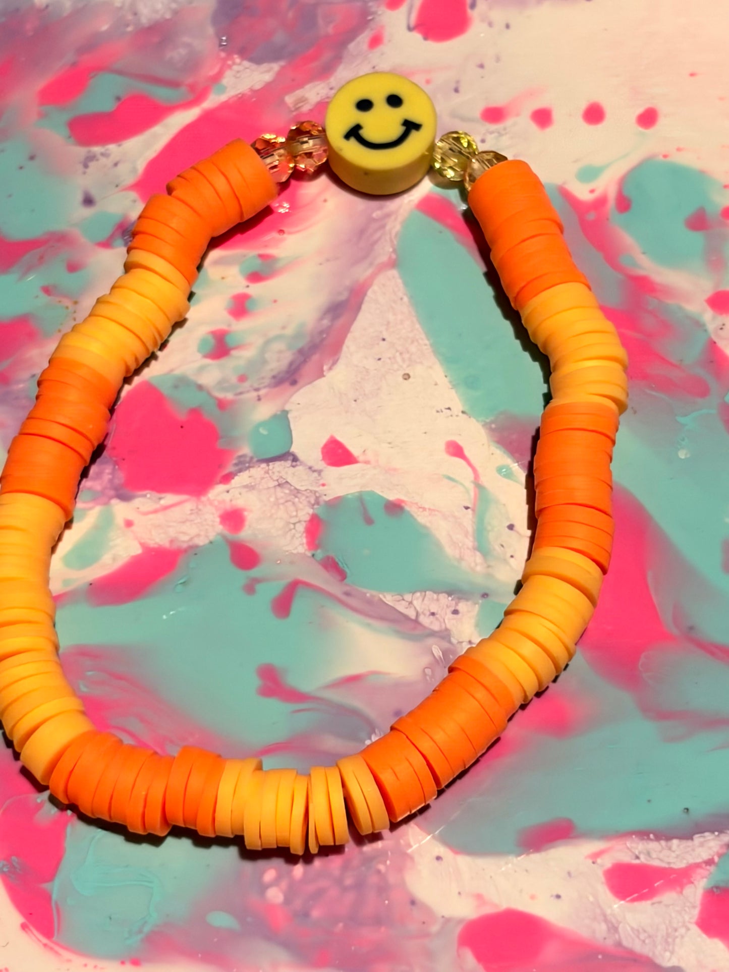 Orange smile face bracelet