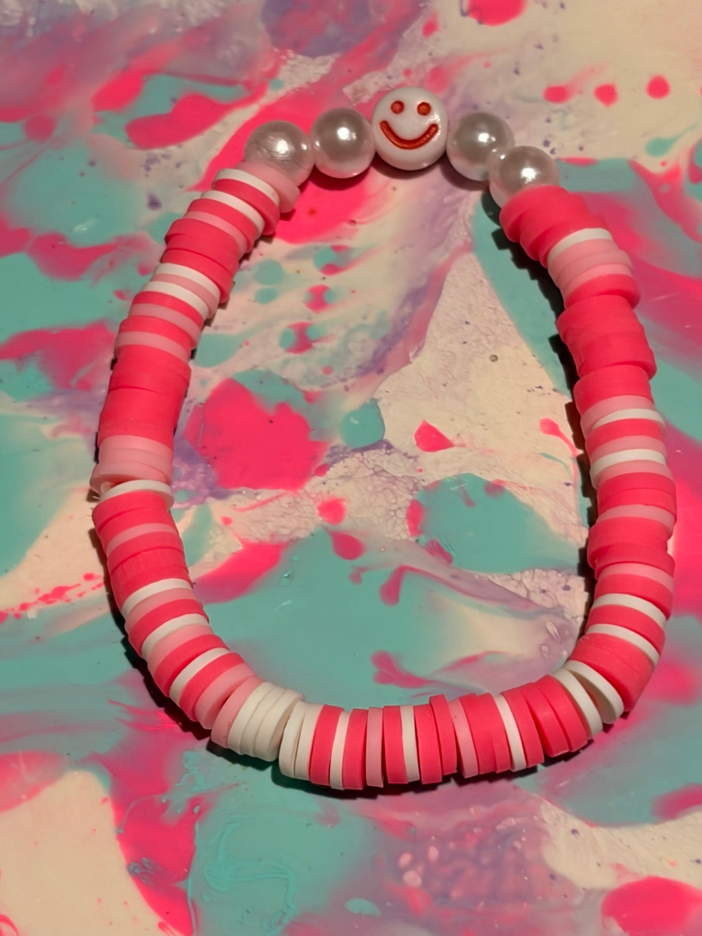Two set of cute smiley face bracelets (pink and blue)