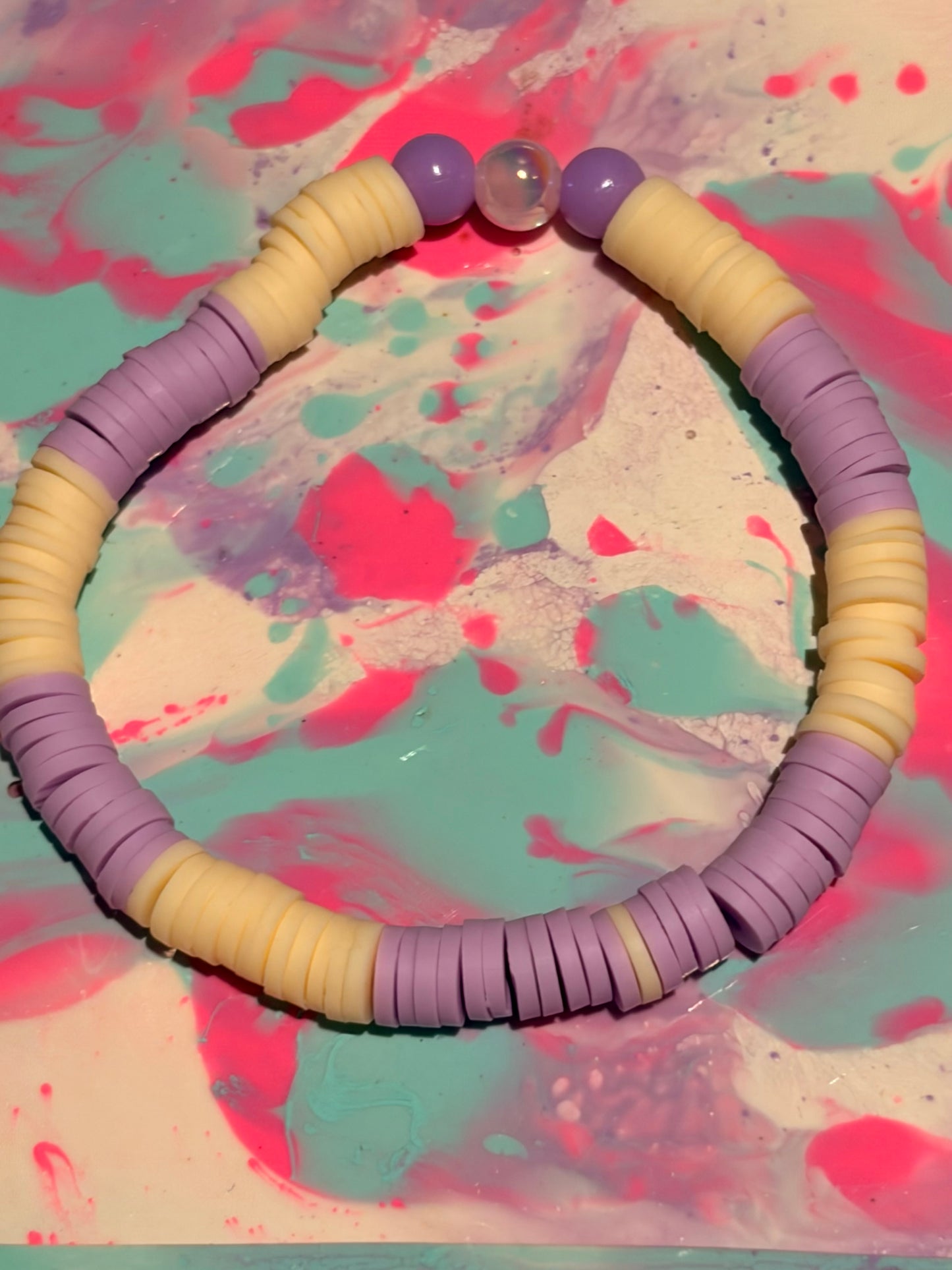 Purple and creme bracelet